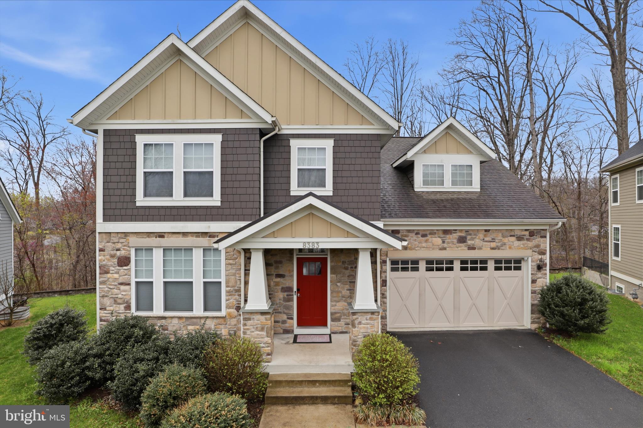 8383 Edward Carr Court Springfield, VA 22153 - Photo 46 of 57 a front view of a house with garden