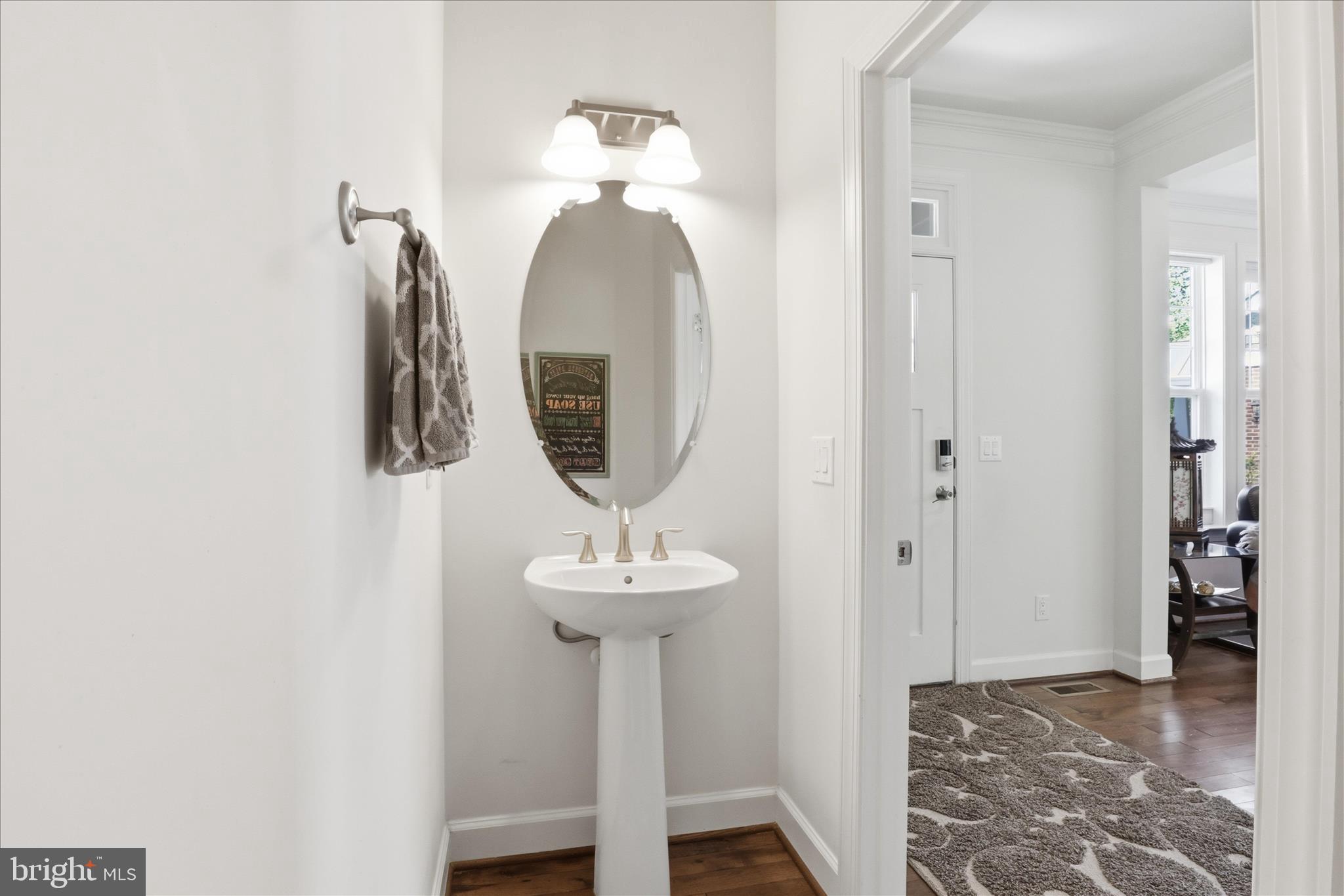 8383 Edward Carr Court Springfield, VA 22153 - Photo 5 of 57 a view of entryway with wooden floor