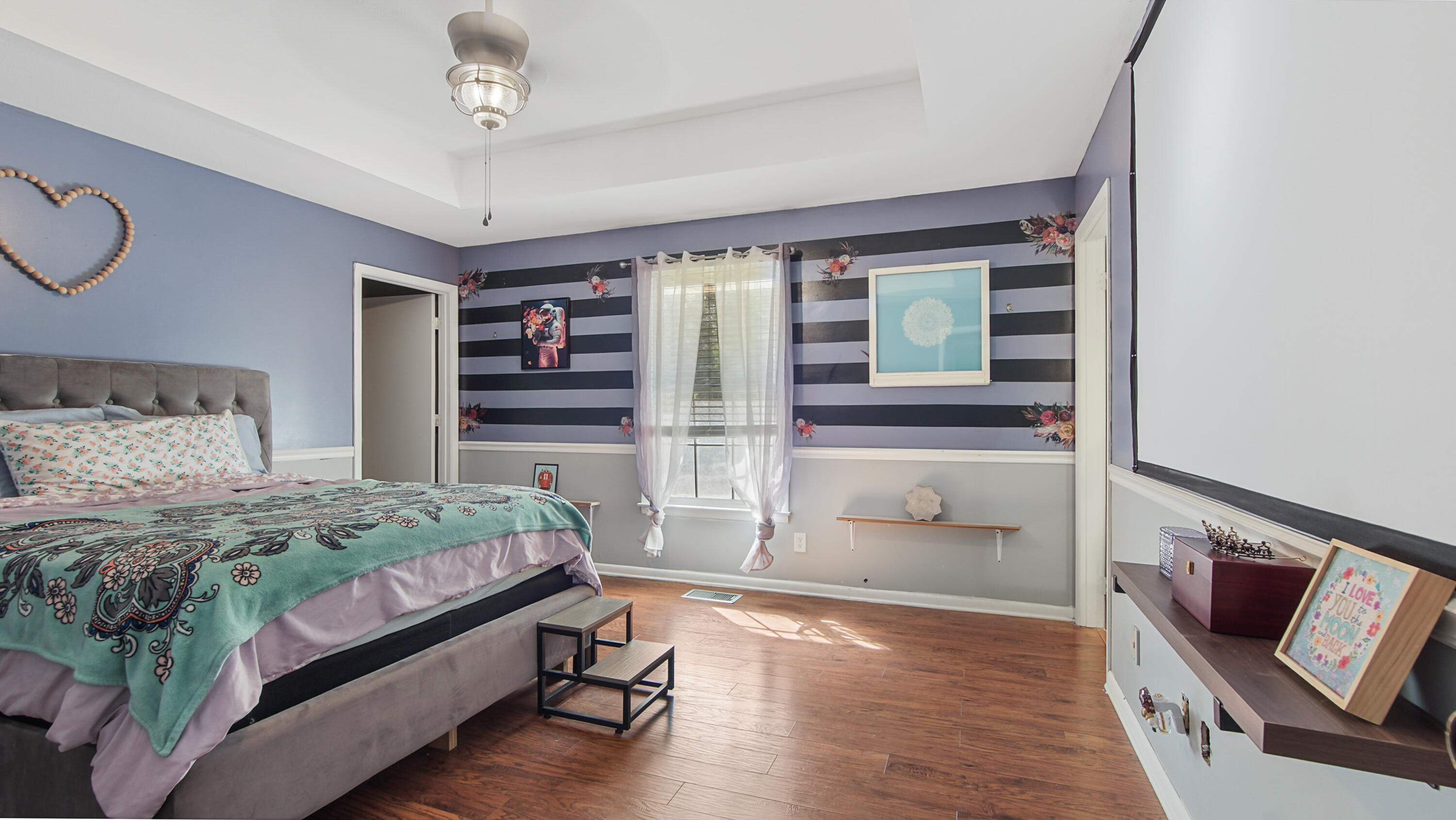 4383 Glen Chambers Road Florala, AL 36442 - Photo 15 of 48 a bedroom with a bed and wooden floor