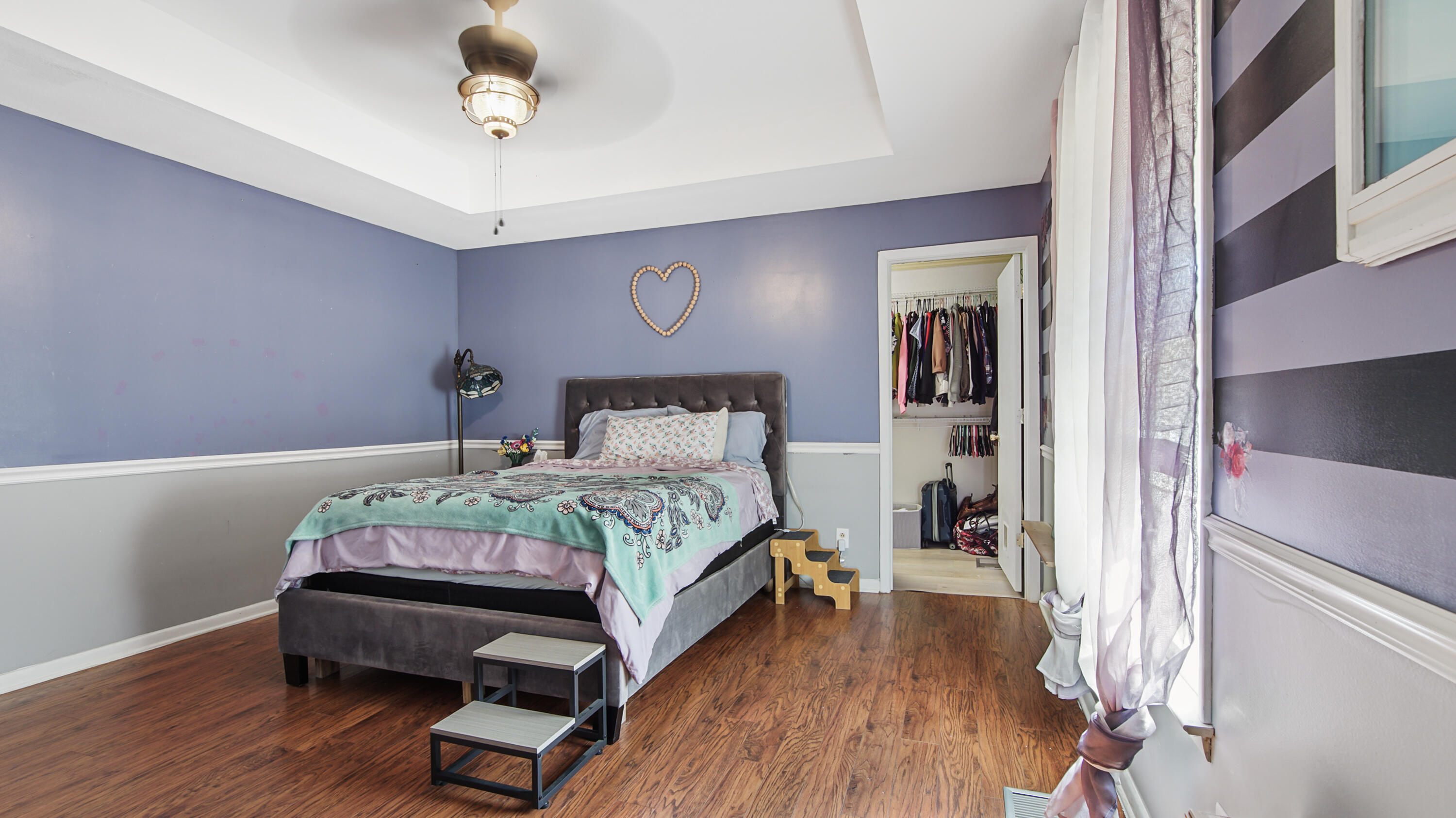 4383 Glen Chambers Road Florala, AL 36442 - Photo 16 of 48 a bedroom with a bed and wooden floor