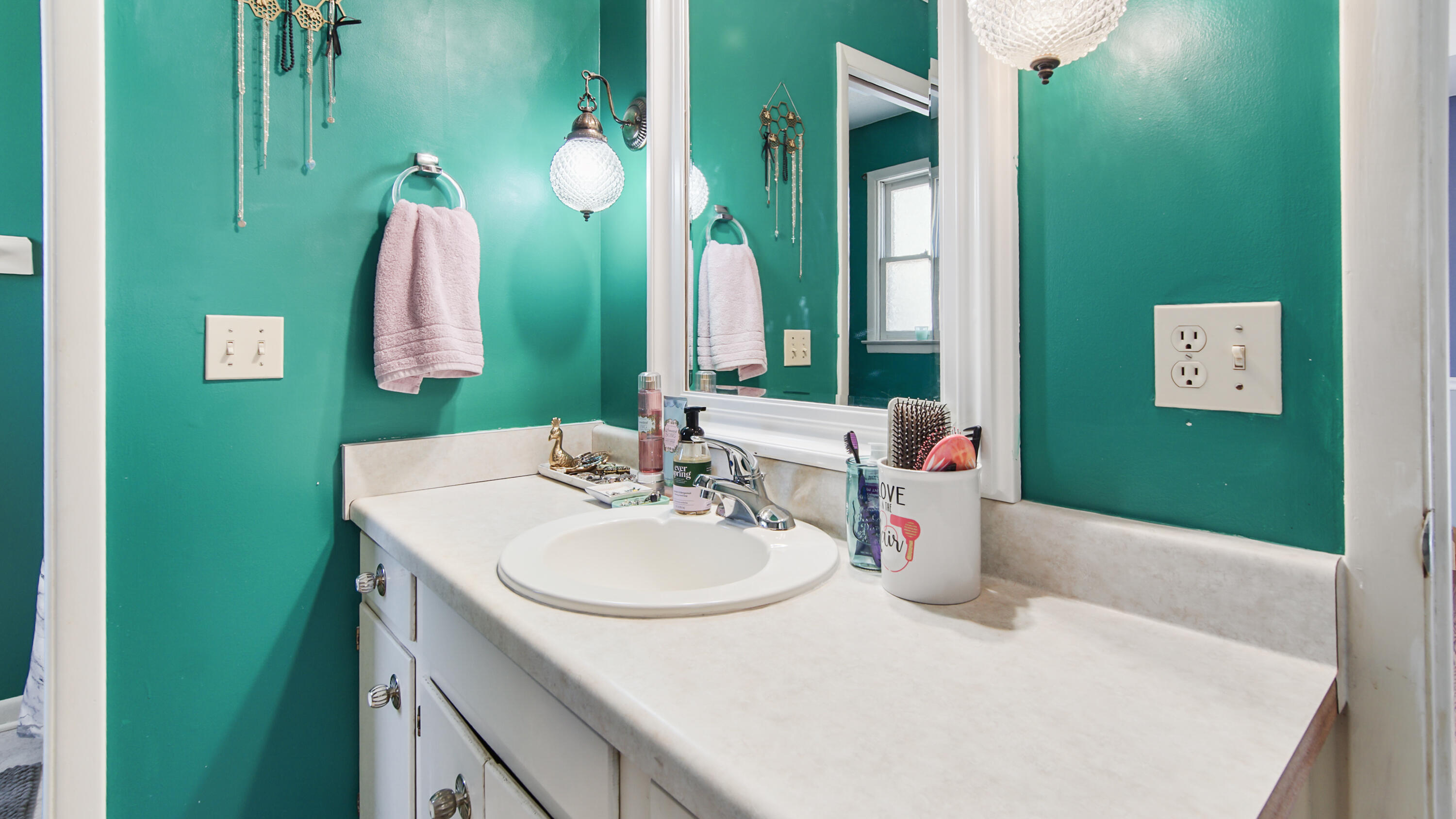 4383 Glen Chambers Road Florala, AL 36442 - Photo 19 of 48 a bathroom with a sink vanity and a mirror