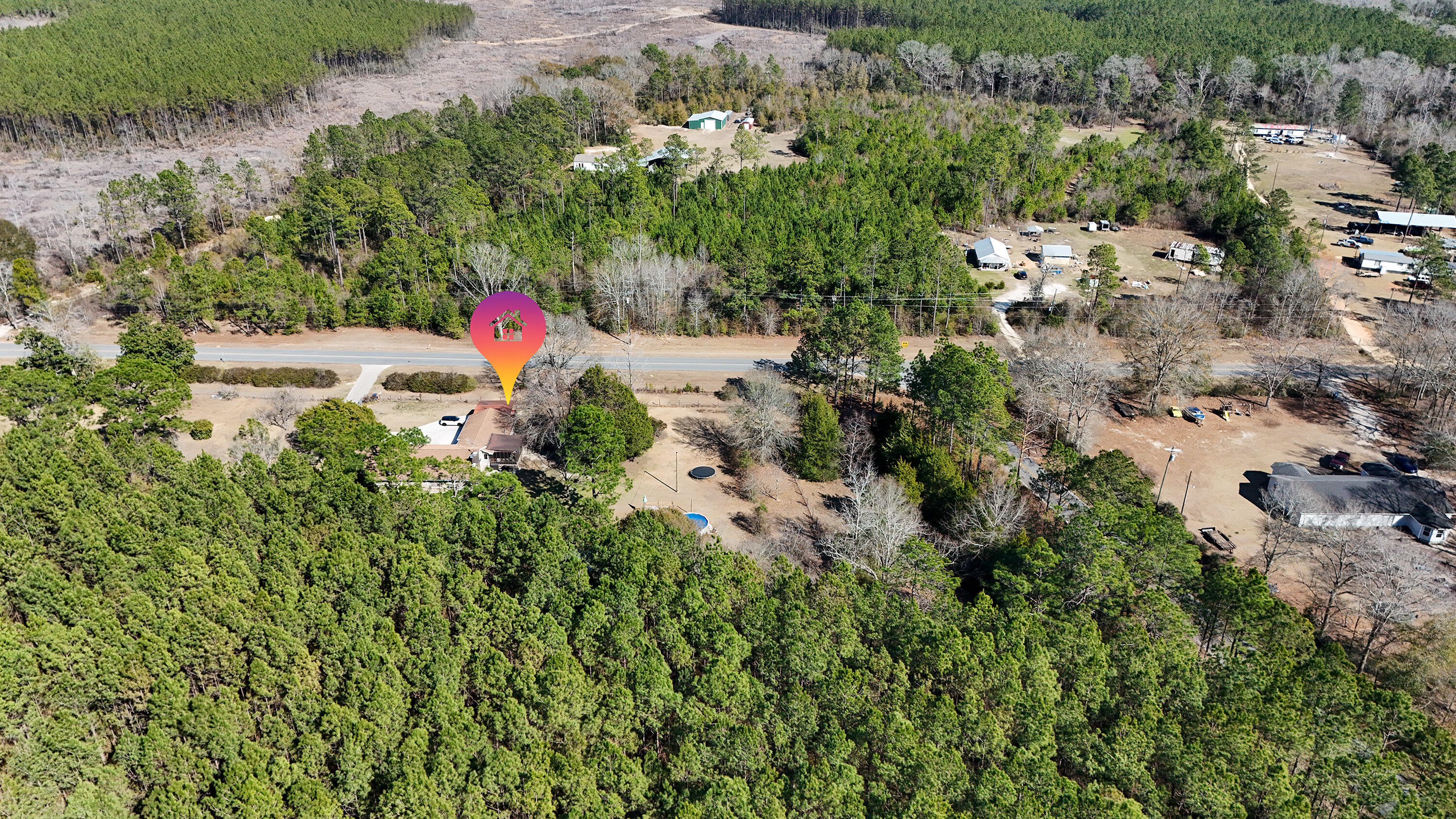 4383 Glen Chambers Road Florala, AL 36442 - Photo 45 of 48 an aerial view of residential houses with outdoor space and trees all around