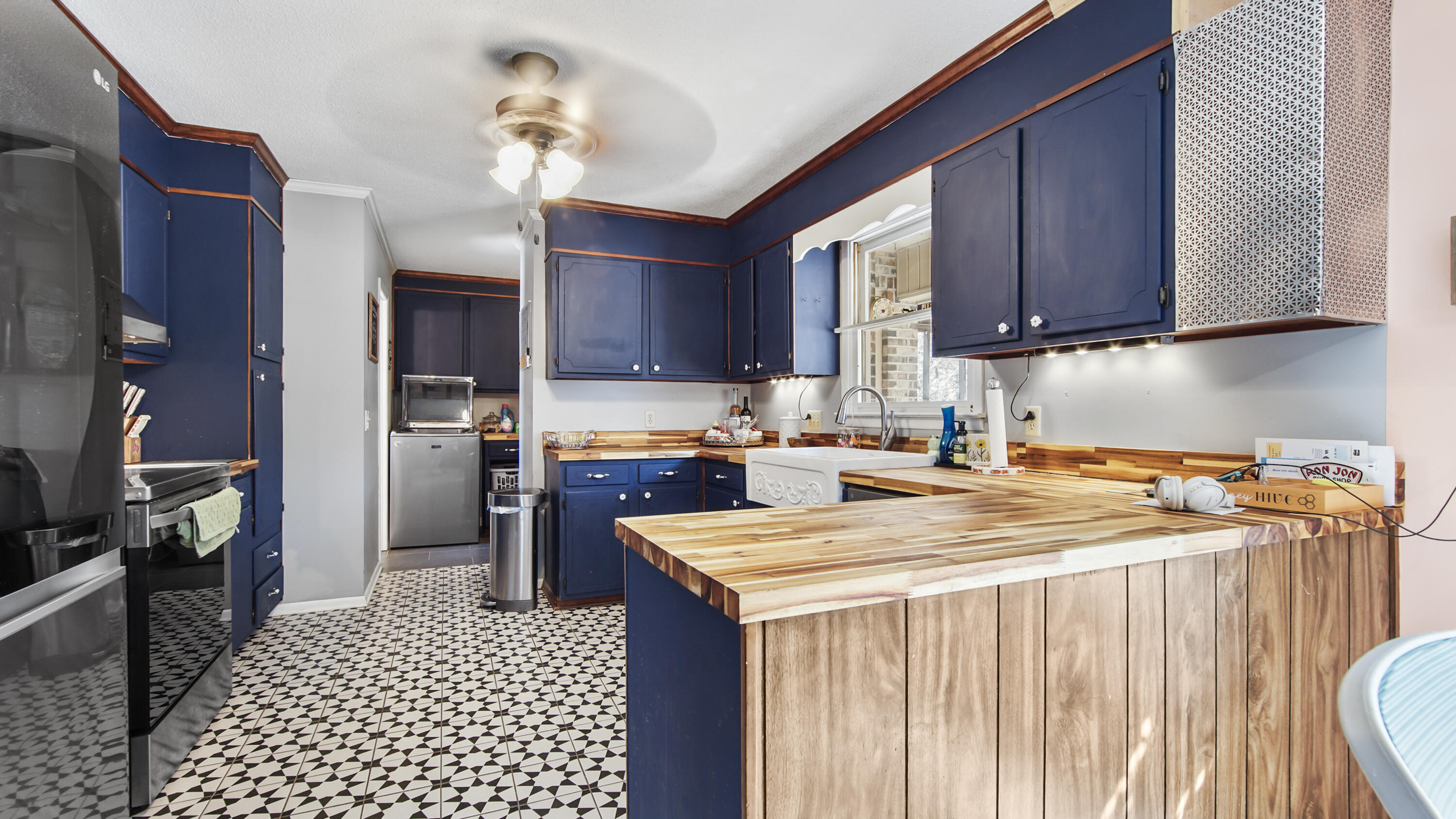 4383 Glen Chambers Road Florala, AL 36442 - Photo 6 of 48 a kitchen with a sink appliances and cabinets