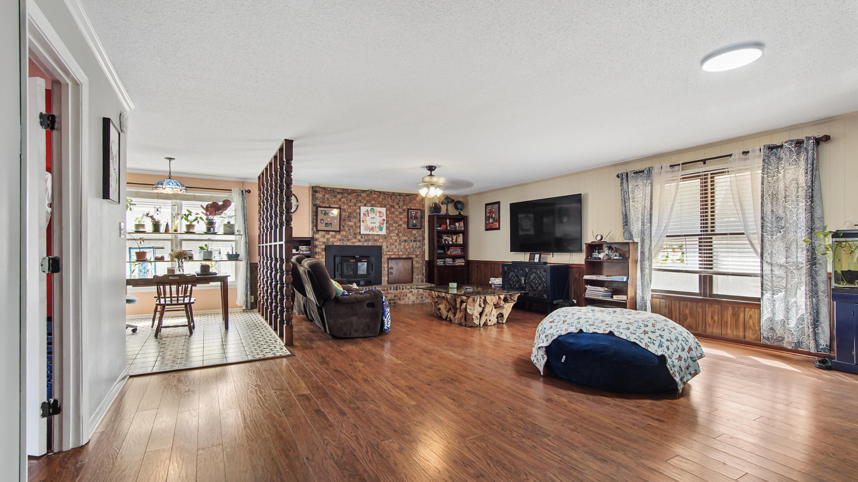 4383 Glen Chambers Road Florala, AL 36442 - Photo 8 of 48 a living room with furniture and a flat screen tv