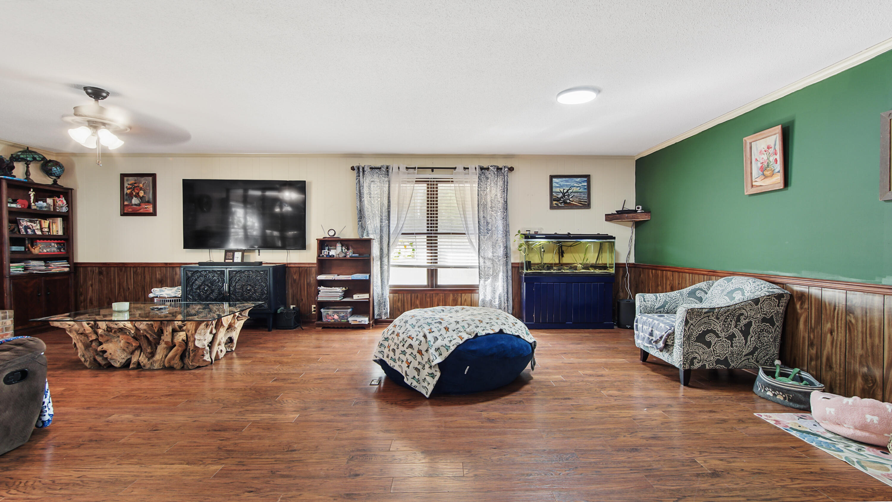 4383 Glen Chambers Road Florala, AL 36442 - Photo 10 of 48 a living room with furniture and a flat screen tv