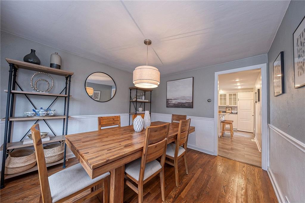 476 Haverhill Road Pittsburgh, PA 15228 - Photo 12 of 36 a view of a dining room with furniture and wooden floor