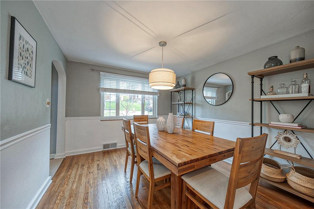 476 Haverhill Road Pittsburgh, PA 15228 - Photo 13 of 36 a view of a dining room with furniture window and wooden floor