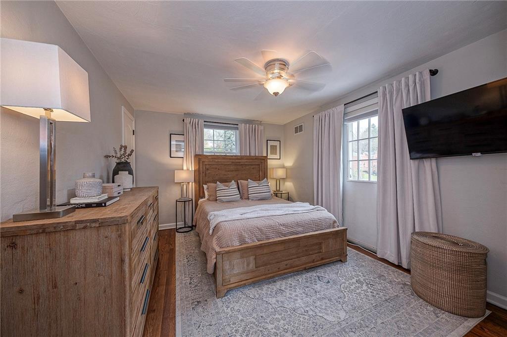 476 Haverhill Road Pittsburgh, PA 15228 - Photo 16 of 36 a bedroom with a bed and a flat screen tv