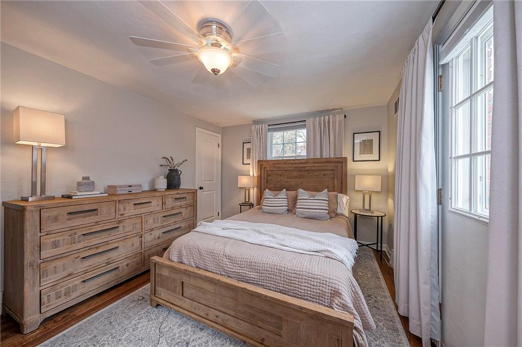 476 Haverhill Road Pittsburgh, PA 15228 - Photo 17 of 36 a bedroom with a bed chandelier and a window