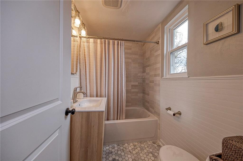 476 Haverhill Road Pittsburgh, PA 15228 - Photo 23 of 36 a bathroom with a bathtub and a shower
