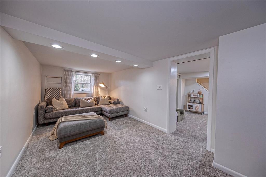 476 Haverhill Road Pittsburgh, PA 15228 - Photo 25 of 36 a living room with furniture and a window