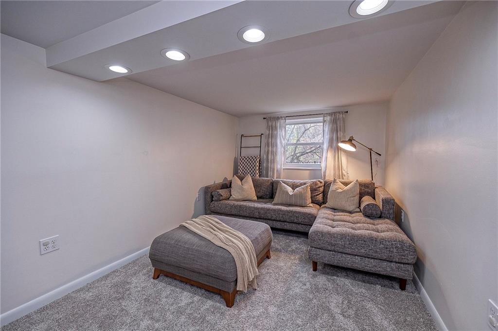 476 Haverhill Road Pittsburgh, PA 15228 - Photo 26 of 36 a living room with furniture and a lamp