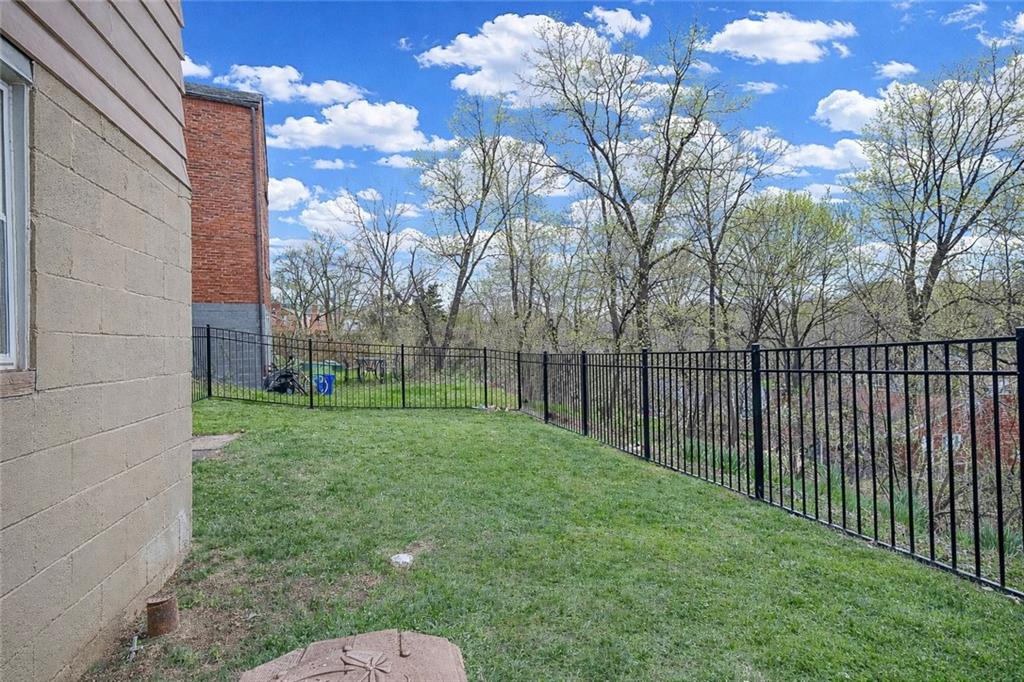 476 Haverhill Road Pittsburgh, PA 15228 - Photo 33 of 36 a view of a backyard with a trees