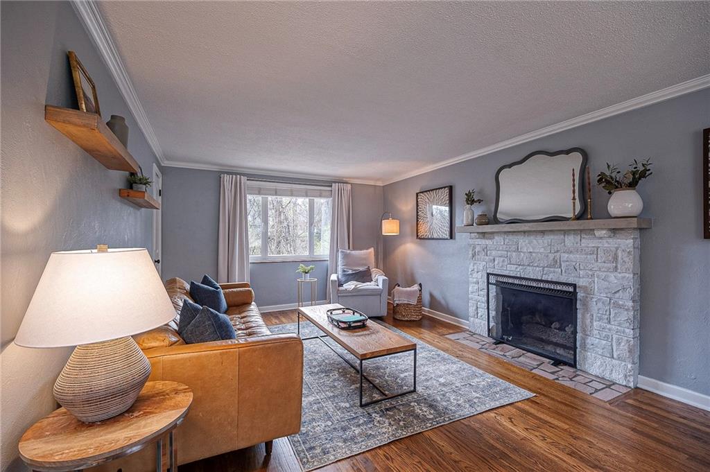 476 Haverhill Road Pittsburgh, PA 15228 - Photo 5 of 36 a living room with furniture a fireplace and window