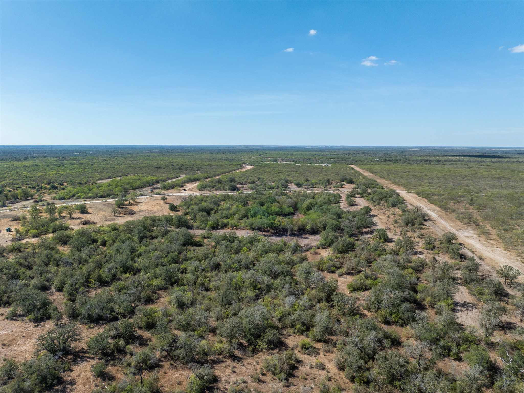 Lot 7 County Road 211 Smiley, TX 78159 - Photo 12 of 16 an aerial view of residential building and ocean