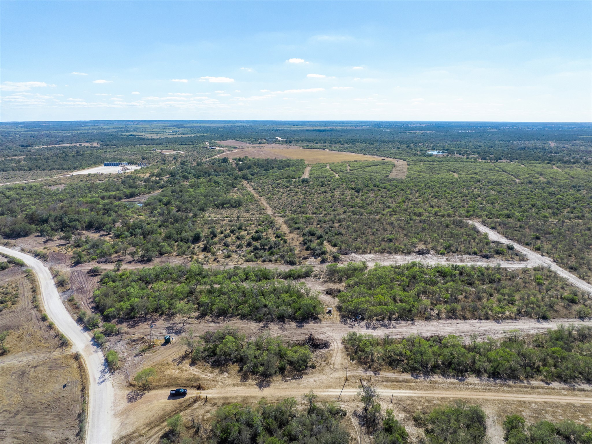Lot 7 County Road 211 Smiley, TX 78159 - Photo 15 of 16 an aerial view of mountain with trees