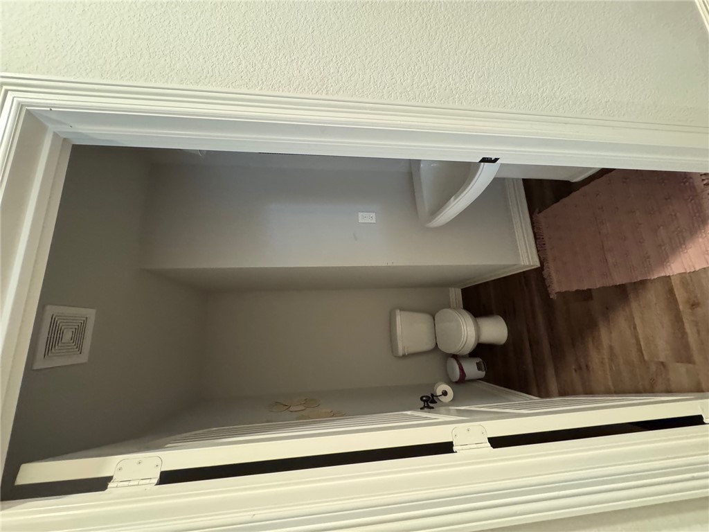 6991 Halter Loop College Station, TX 77845 - Photo 6 of 10 a bathroom with a sink and a toilet