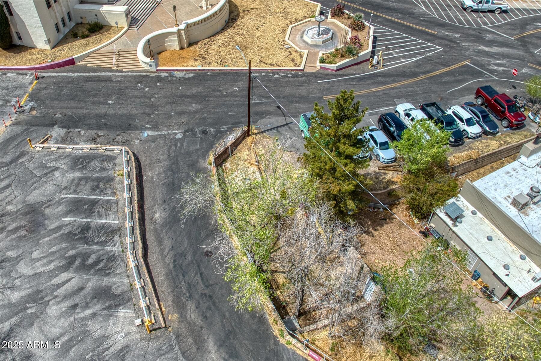 10 Quality Hill Road, Unit 5 Bisbee, AZ 85603 - Photo 10 of 13 a vase of flowers sitting on a table