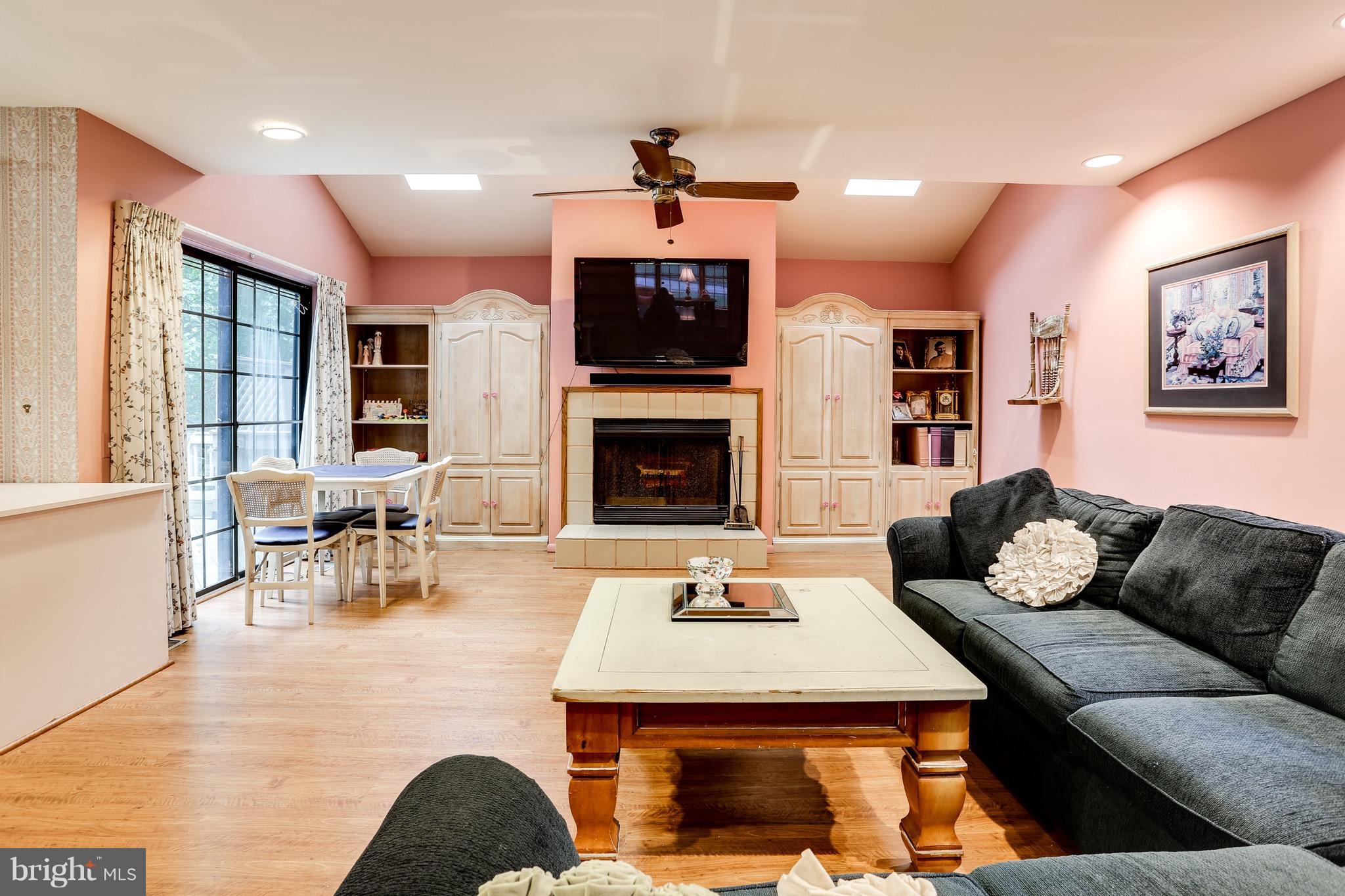 2017 Burdock Road Baltimore, MD 21209 - Photo 8 of 25 Family Room w/ Fireplace & Built In Cabinetry