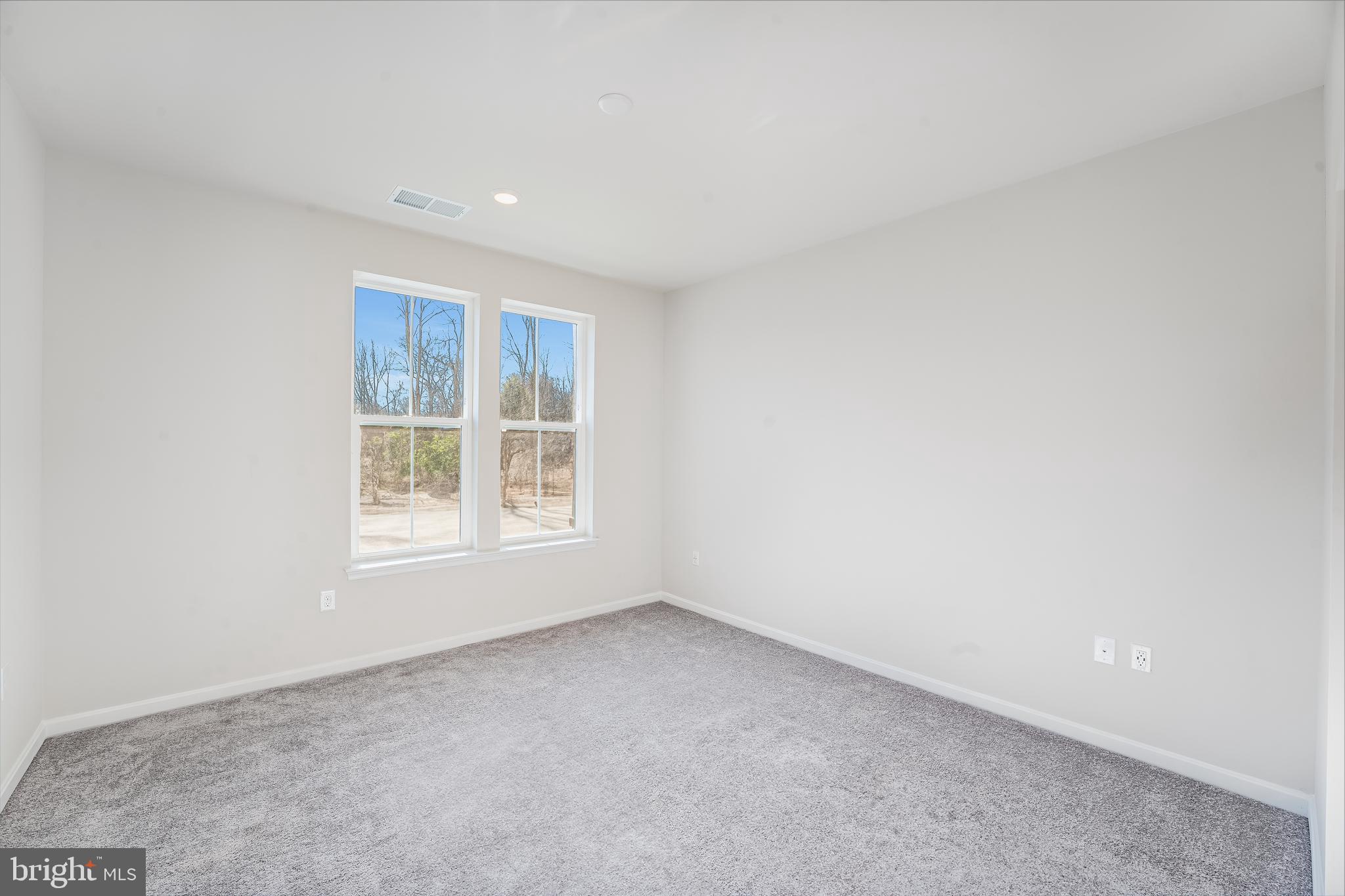 4005 Seaside Alder Road, Unit D Bowie, MD 20720 - Photo 14 of 19 an empty room with a window