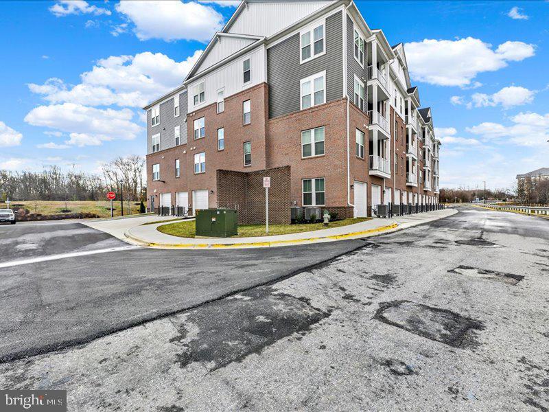 4005 Seaside Alder Road, Unit D Bowie, MD 20720 - Photo 41 of 41 a view of road with yard