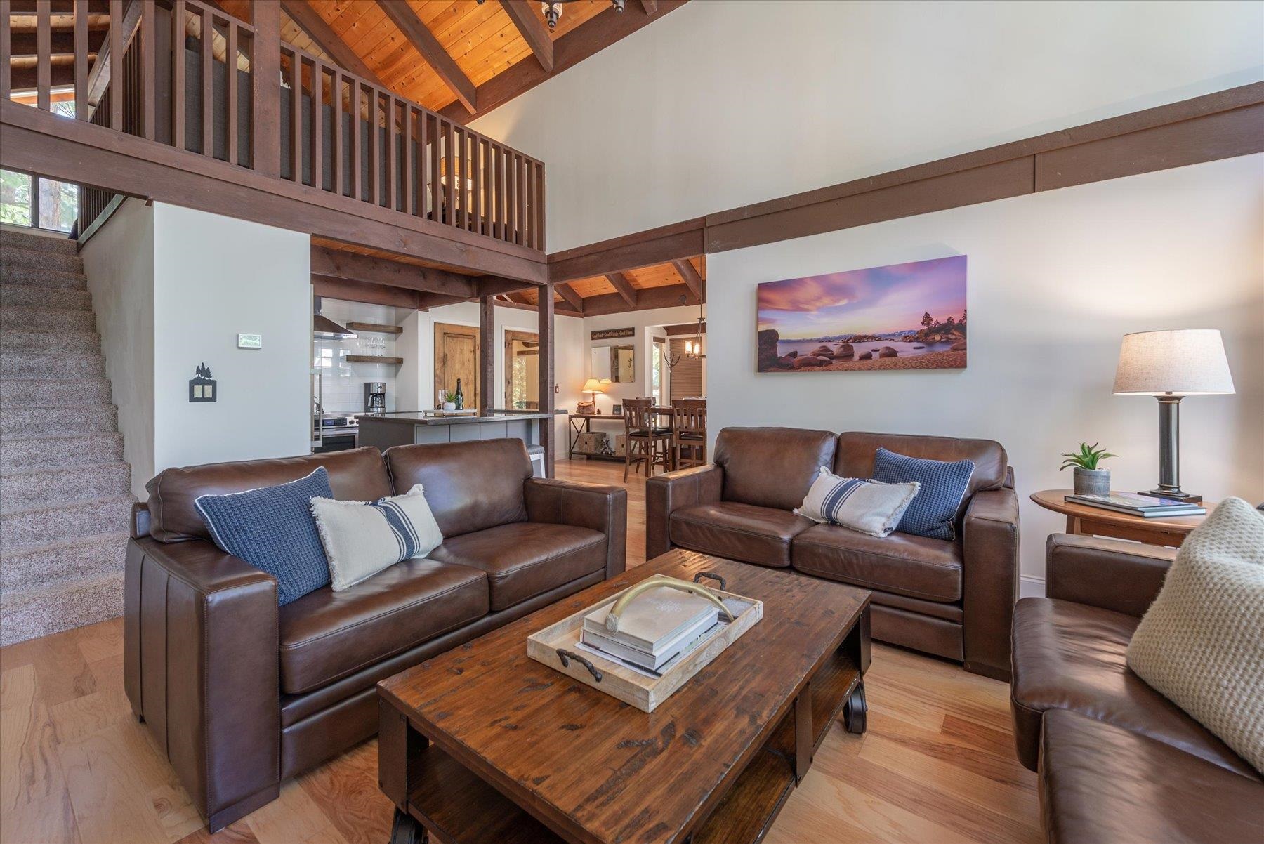 1502 Logging Trail Truckee, CA 96161 - Photo 11 of 21 a living room with furniture a rug and a lamp