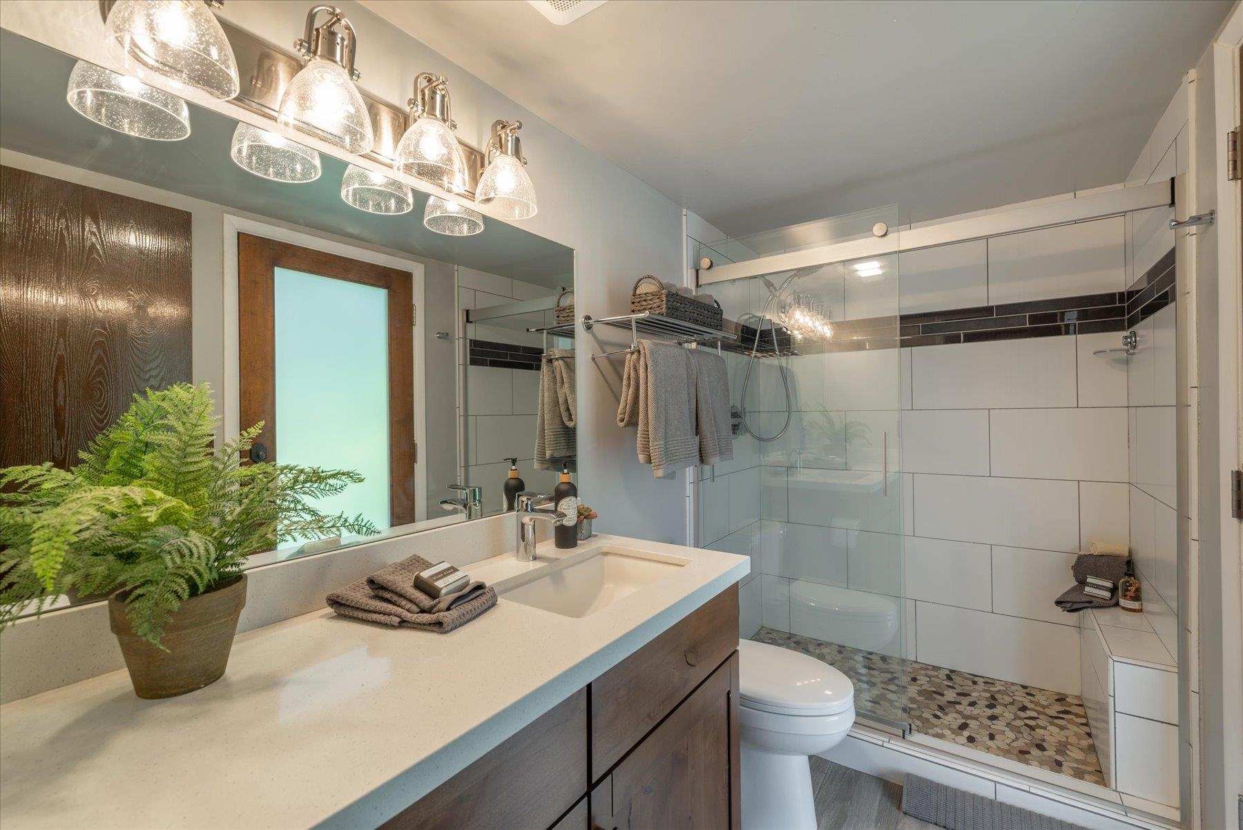 1502 Logging Trail Truckee, CA 96161 - Photo 9 of 21 a bathroom with a sink a toilet and shower