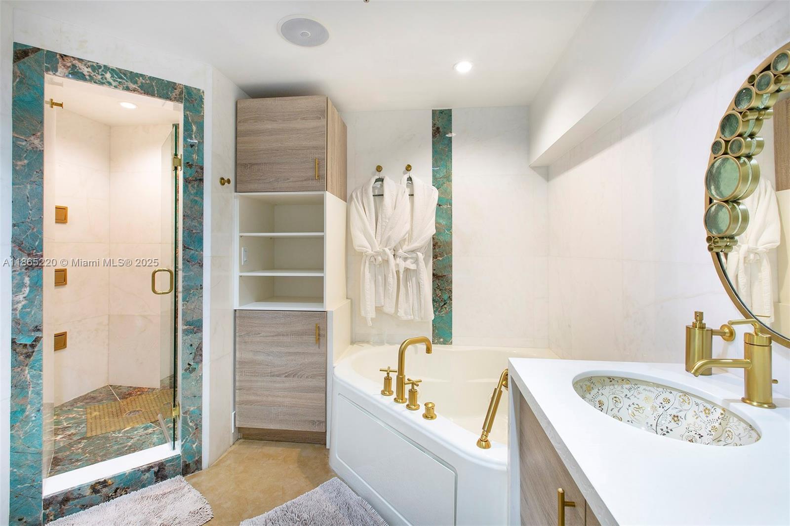 5445 Collins Avenue, Unit P2 Miami Beach, FL 33140 - Photo 29 of 62 a bathroom with a tub a sink and a shower