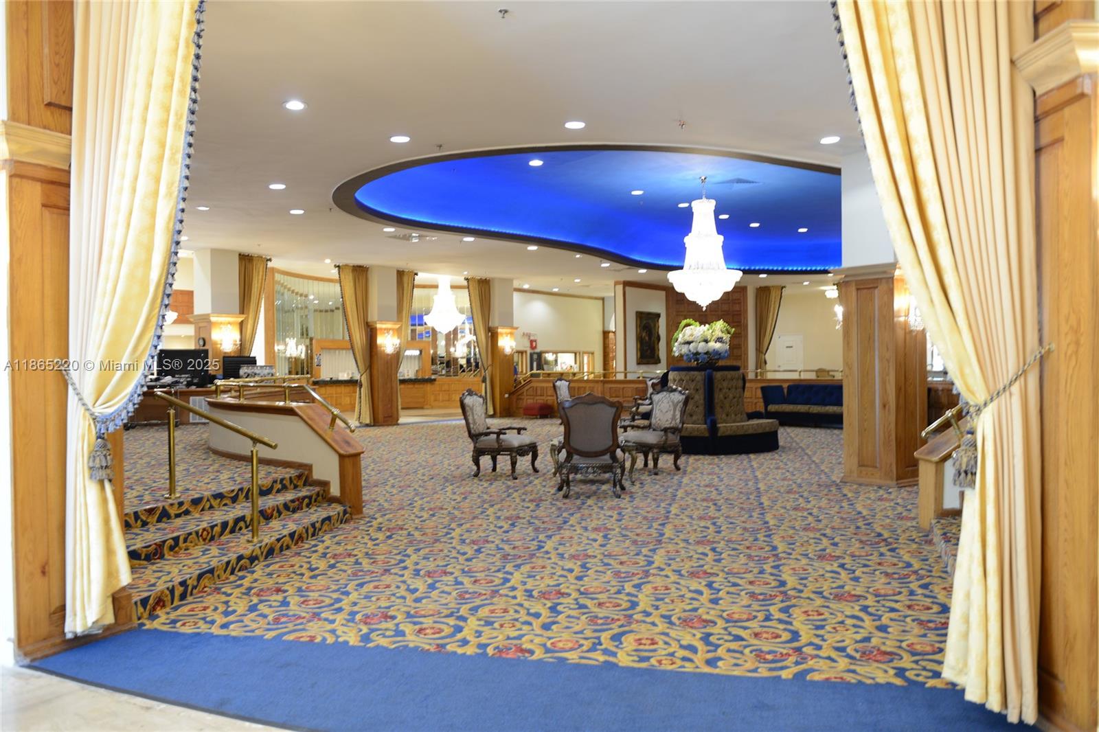 5445 Collins Avenue, Unit P2 Miami Beach, FL 33140 - Photo 4 of 62 a view of a dining room with furniture and a rug