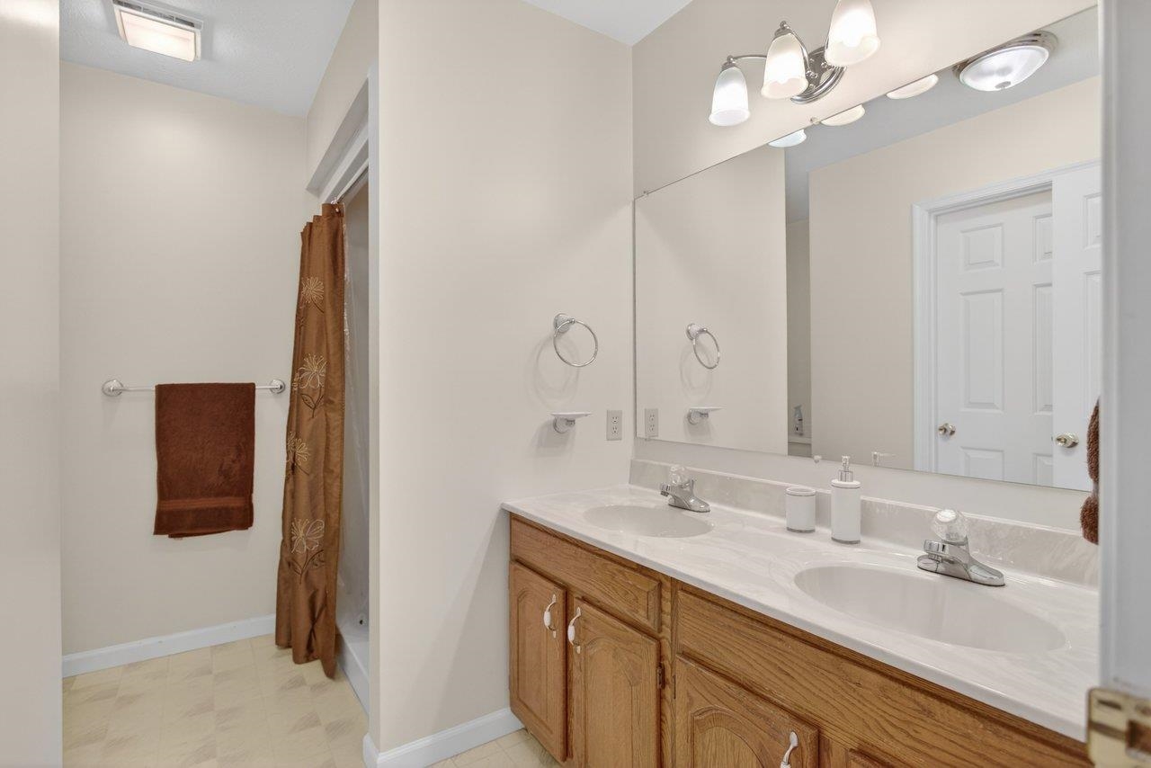2220 Pine Woods Road Quicksburg, VA 22847 - Photo 62 of 75 Features double sinks and a large shower.