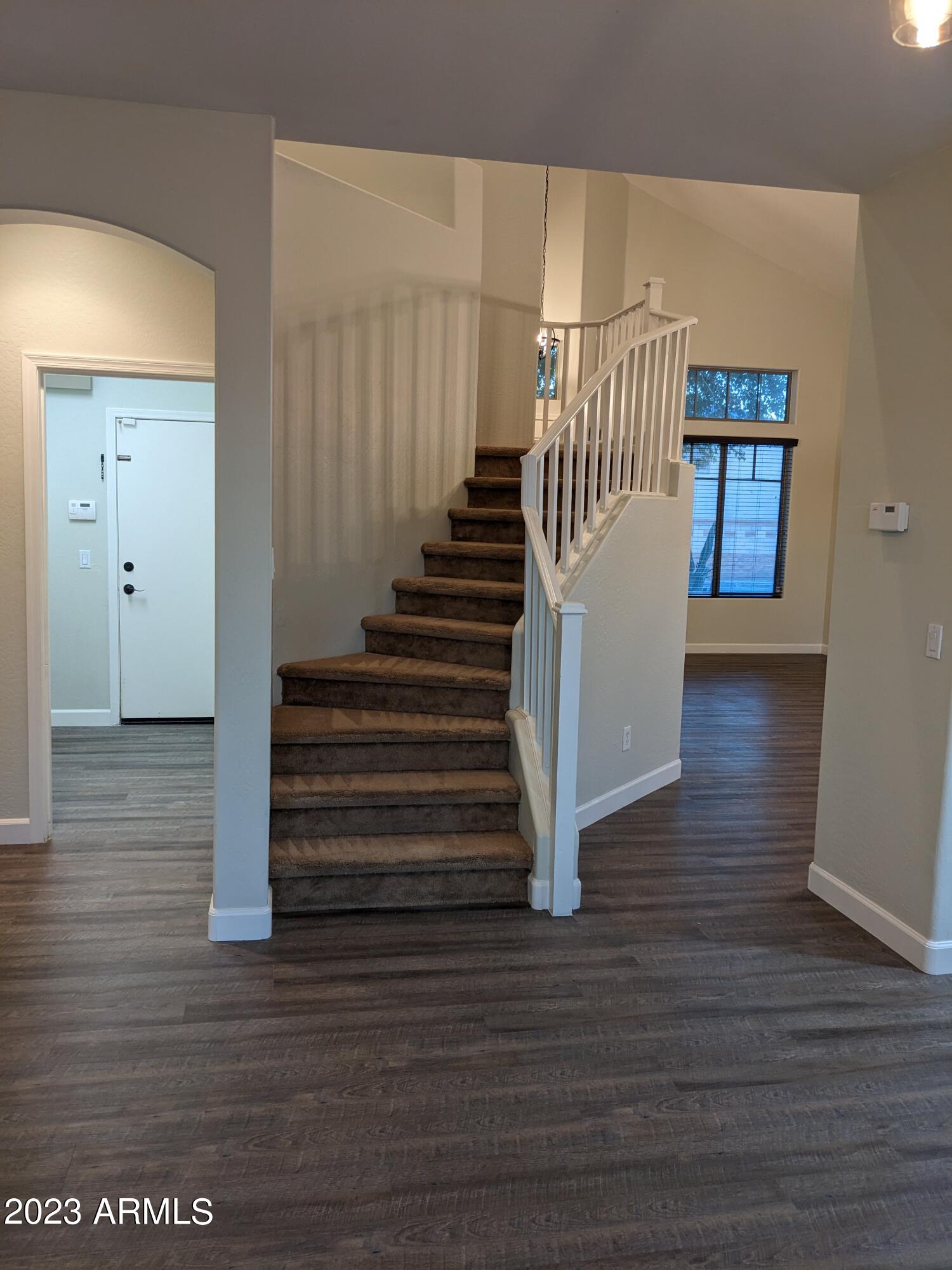 14099 West Riviera Drive Surprise, AZ 85379 - Photo 10 of 27 a view of entryway with wooden floor