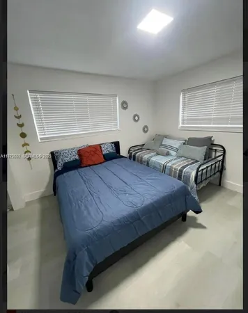 a bathroom with a shower and a bathtub