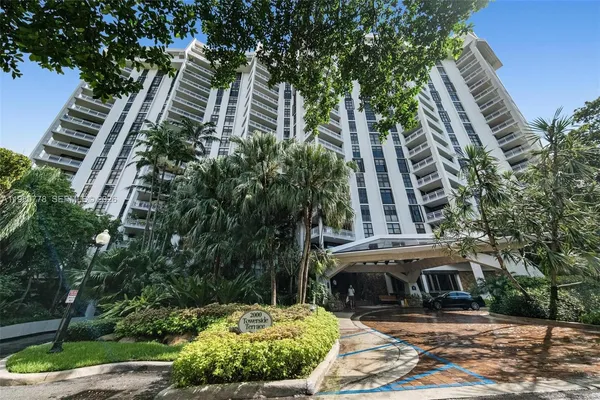 a view of a building with a garden
