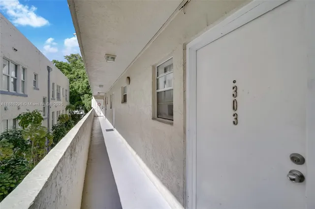 a view of balcony with wooden floor and stairs
