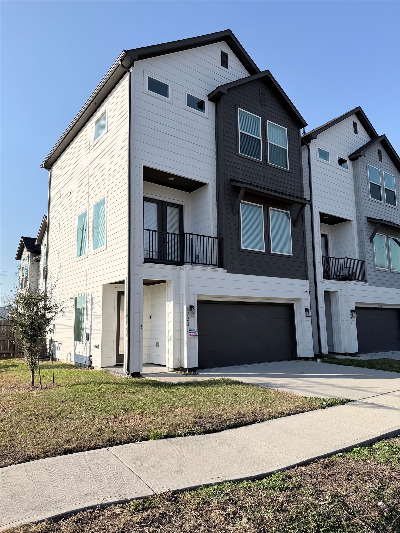 5928 Conley Street Houston, TX 77021 - Photo 2 of 12 a front view of a house with a yard