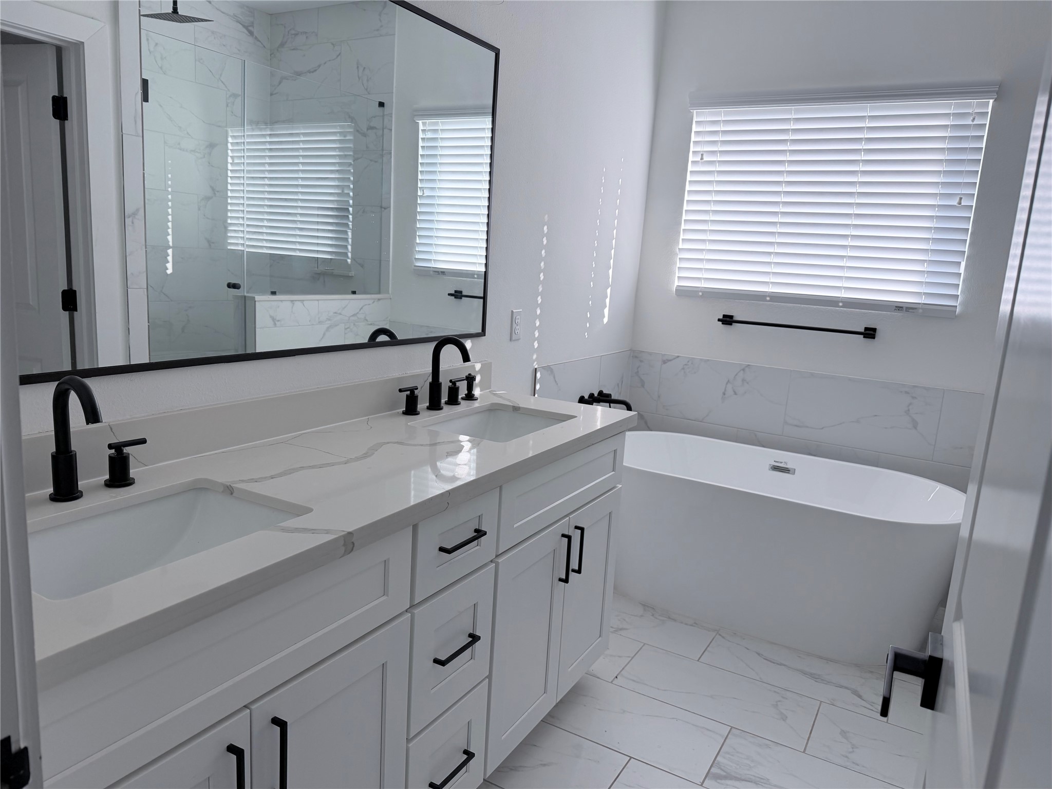 5928 Conley Street Houston, TX 77021 - Photo 10 of 12 a bathroom with a sink and a bathtub