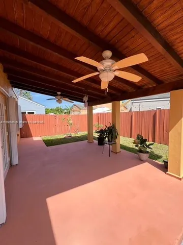 a view of a backyard of a house