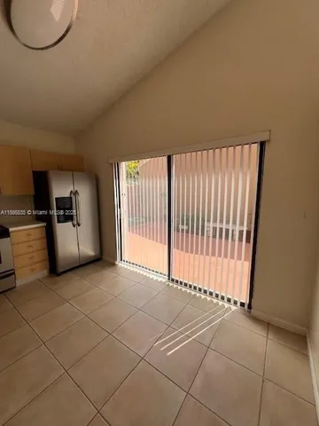 a view of a livingroom with a patio and a fireplace
