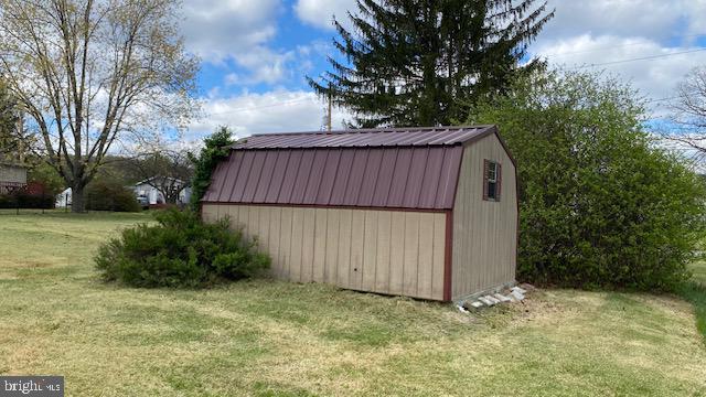 130 Silverford Heights Road Mount Union, PA 17066 - Photo 15 of 20 Charming shed nestled in green landscape.