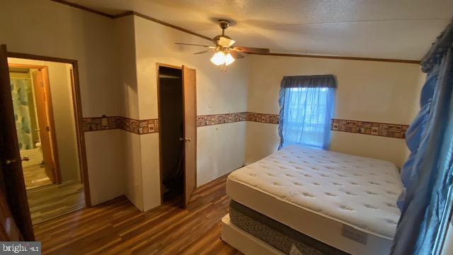 130 Silverford Heights Road Mount Union, PA 17066 - Photo 9 of 20 Cozy bedroom with warm wood accents.