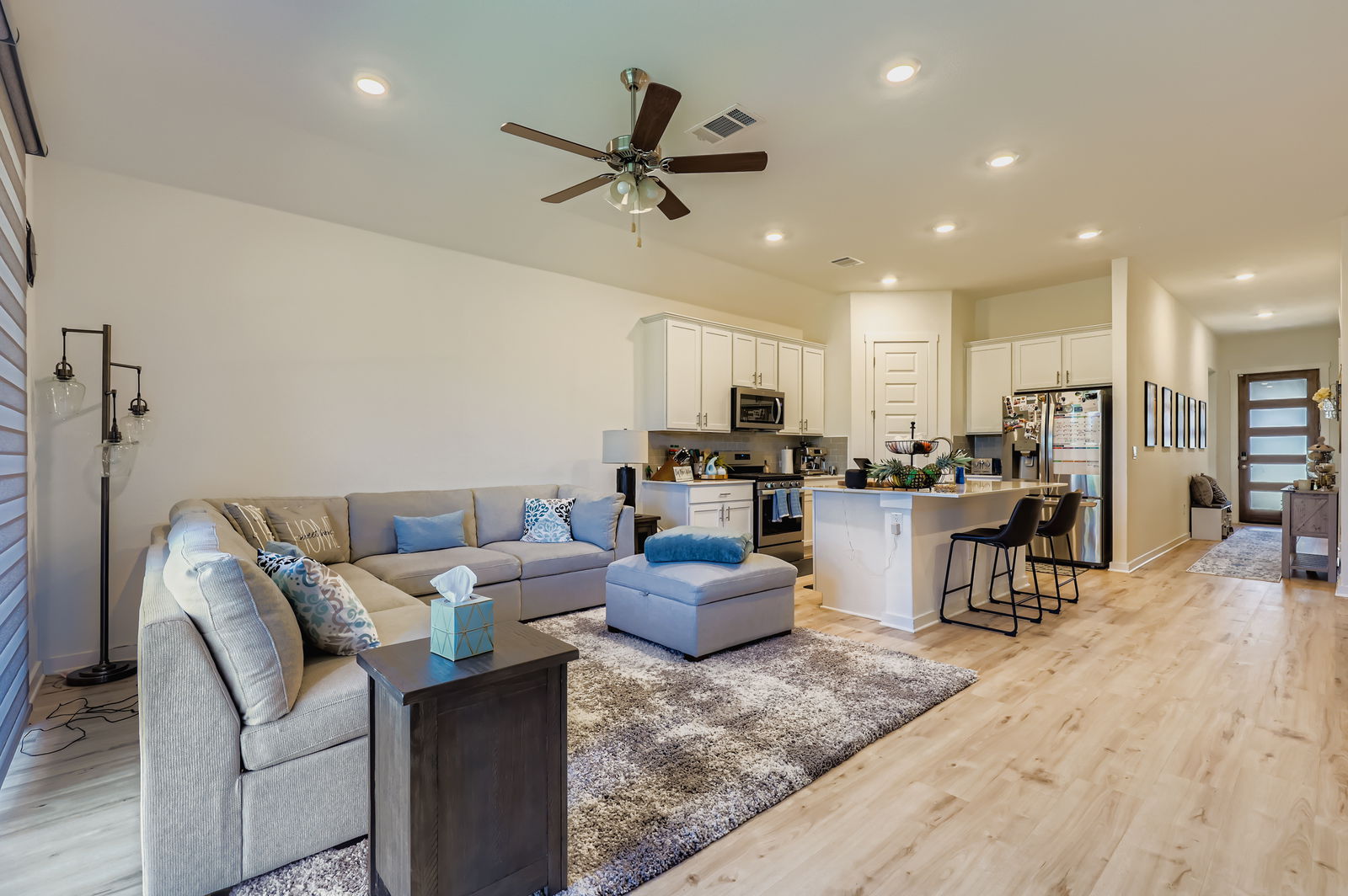 1909 Ruger Pass Leander, TX 78641 - Photo 6 of 31 Living room featuring light wood-style floors, recessed lighting, and ceiling fan