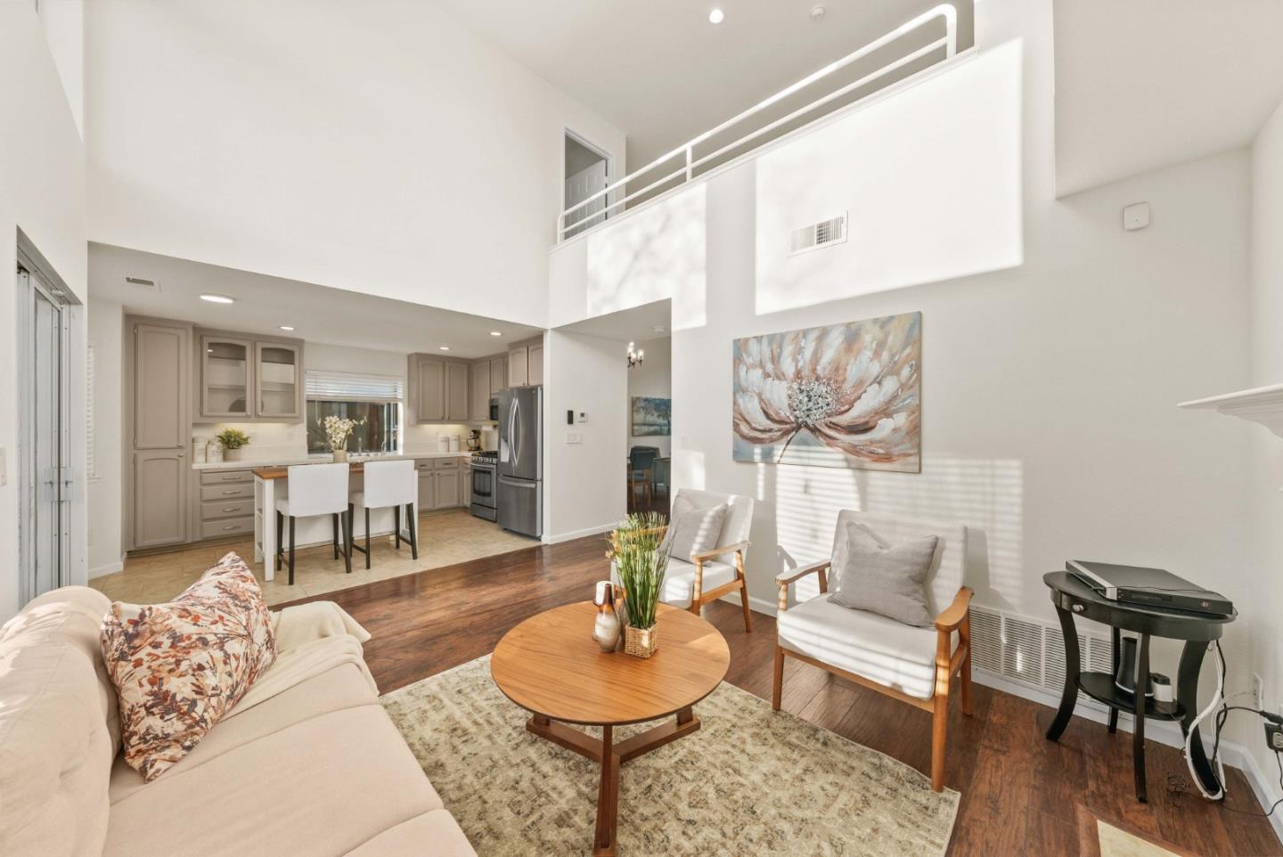 7385 Forsum Road San Jose, CA 95138 - Photo 11 of 40 a living room with furniture and a wooden floor