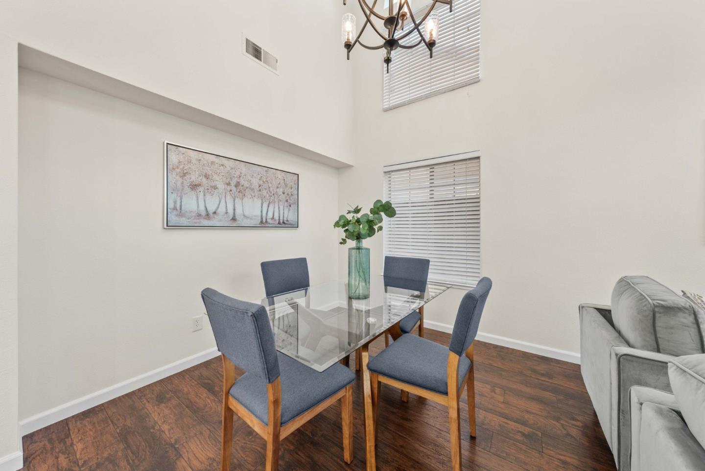 7385 Forsum Road San Jose, CA 95138 - Photo 12 of 40 a view of a dining room with furniture and wooden floor