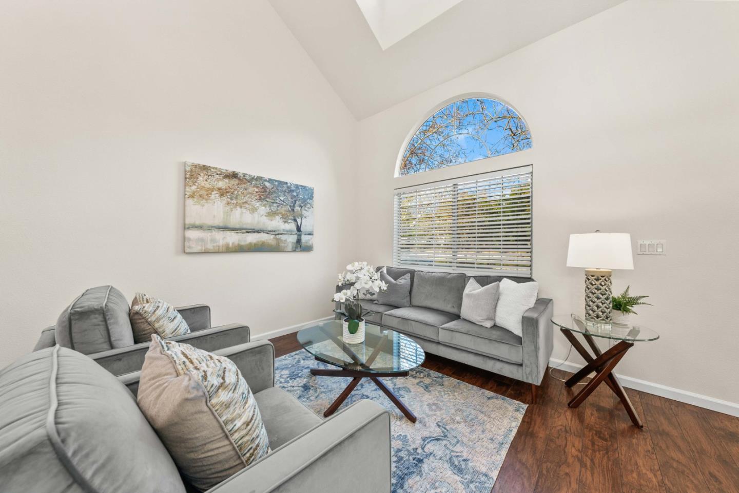 7385 Forsum Road San Jose, CA 95138 - Photo 13 of 40 a living room with furniture a rug and a window