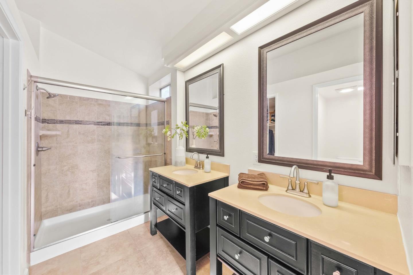 7385 Forsum Road San Jose, CA 95138 - Photo 20 of 40 a bathroom with a granite countertop sink mirror bathtub and shower