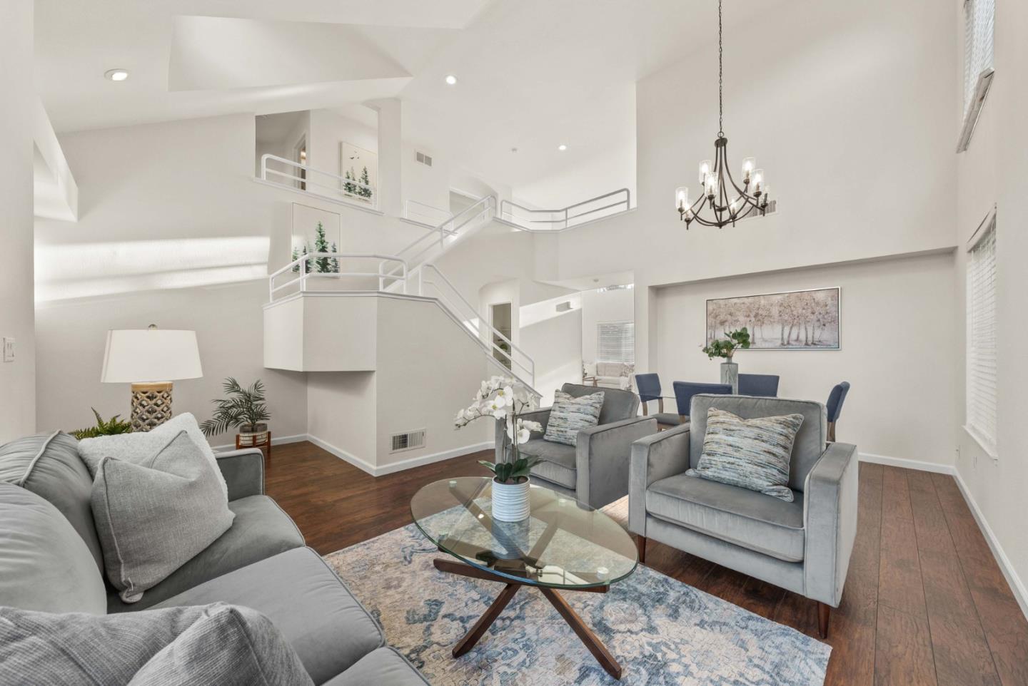 7385 Forsum Road San Jose, CA 95138 - Photo 2 of 40 a living room with furniture or kitchen and a chandelier
