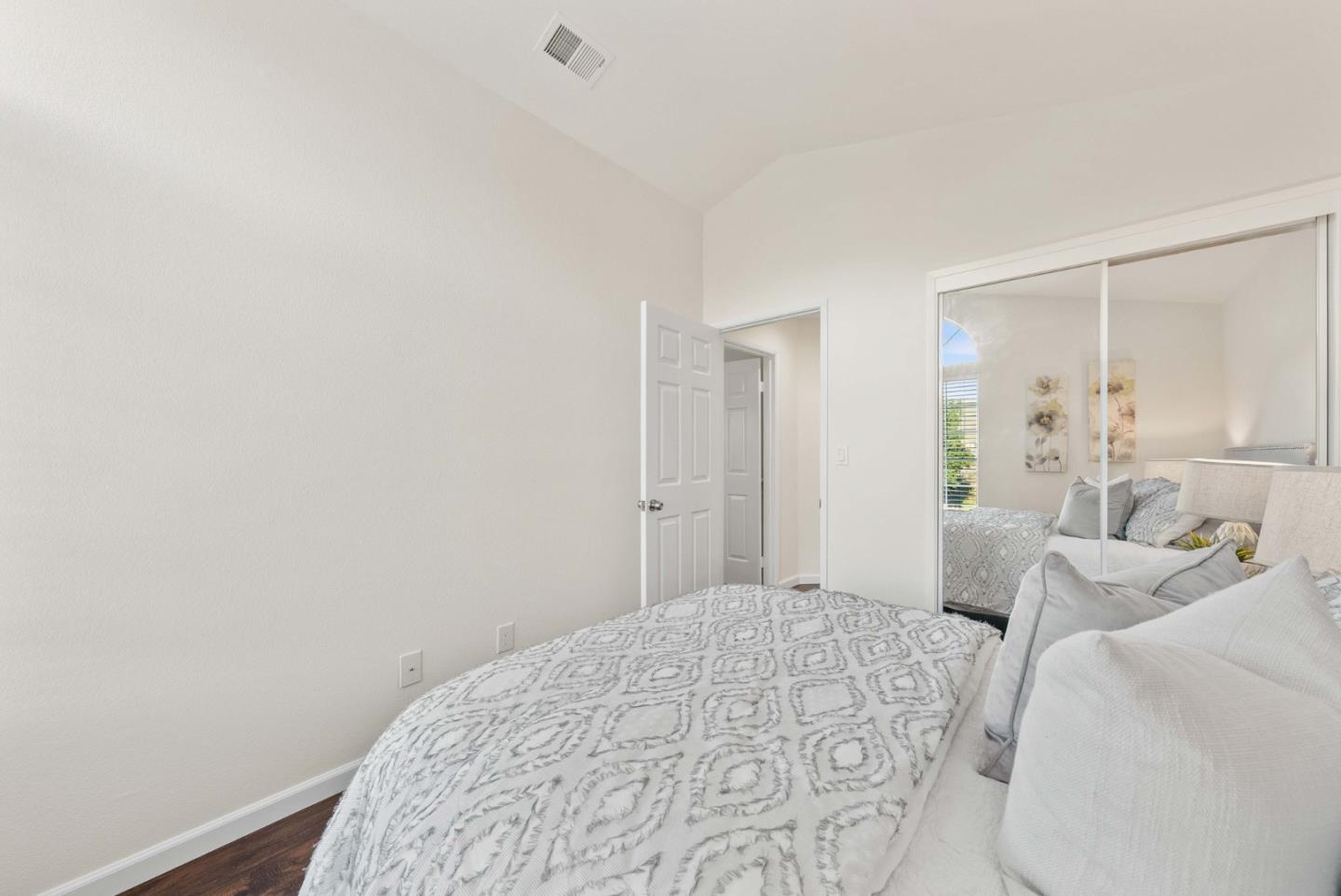 7385 Forsum Road San Jose, CA 95138 - Photo 22 of 40 a bedroom with a bed and a window