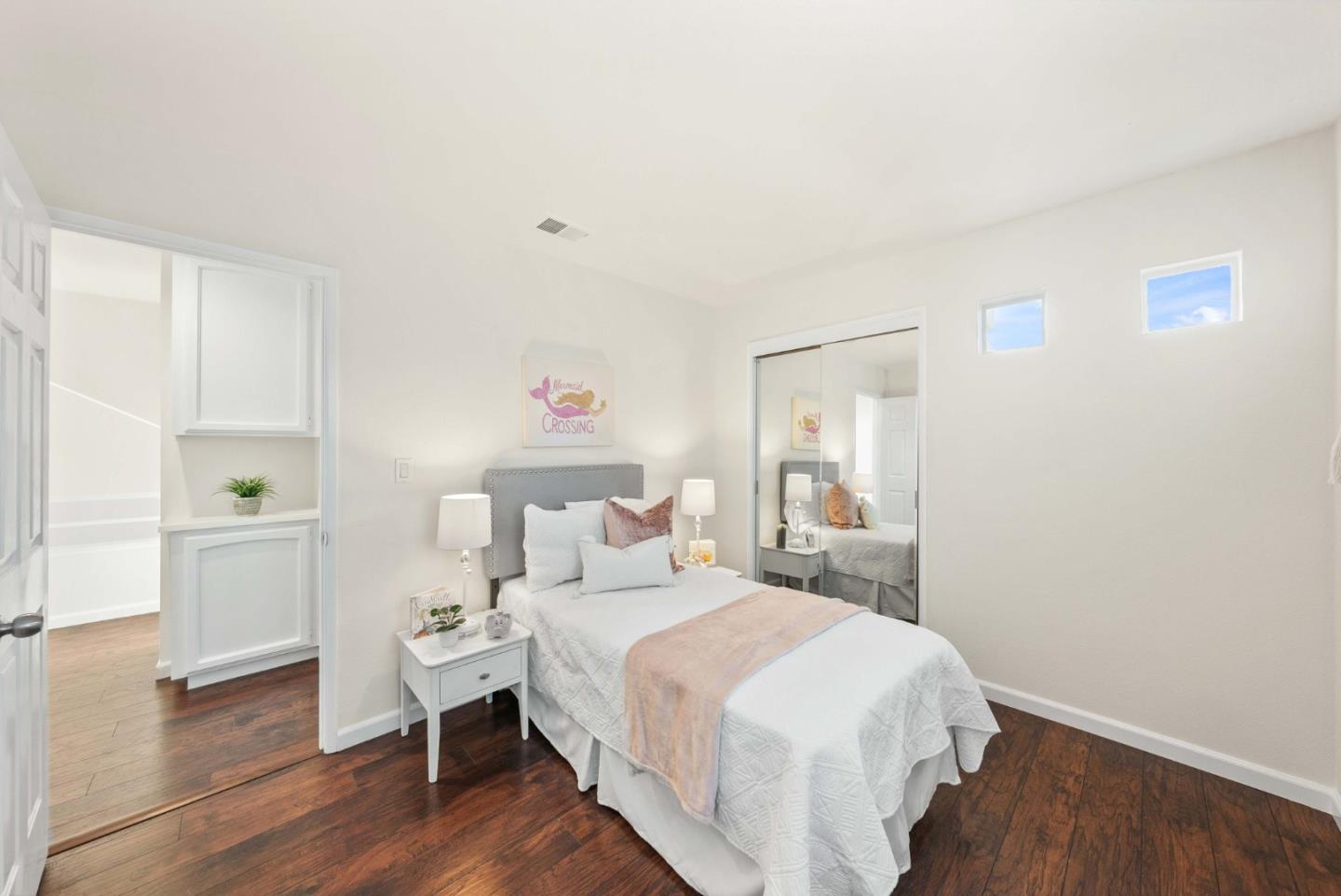 7385 Forsum Road San Jose, CA 95138 - Photo 24 of 40 a bedroom with a bed and a window