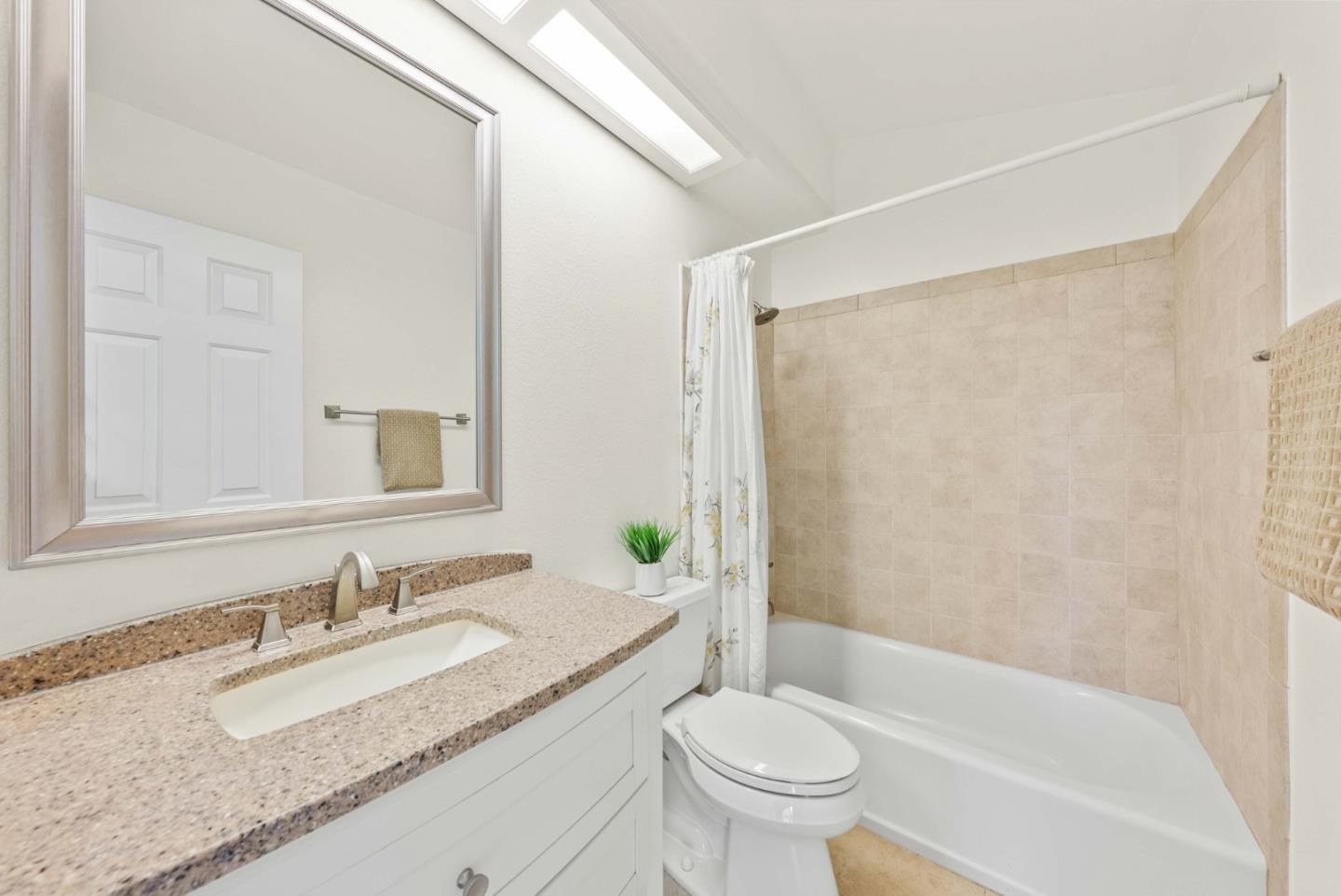 7385 Forsum Road San Jose, CA 95138 - Photo 25 of 40 a bathroom with a granite countertop sink toilet and shower