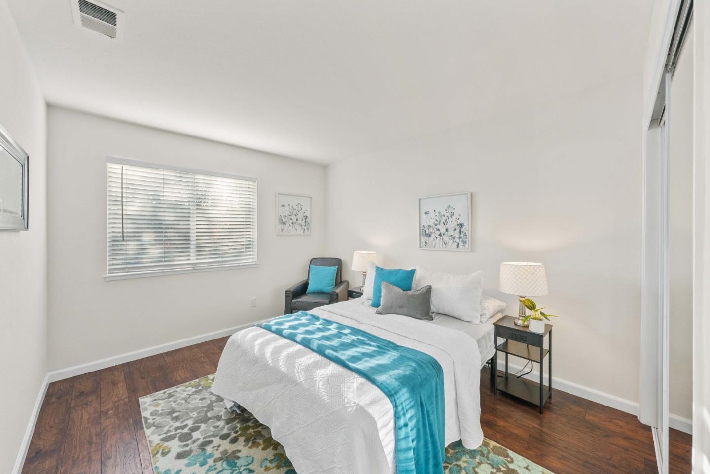 7385 Forsum Road San Jose, CA 95138 - Photo 27 of 40 a bedroom with a bed and a window